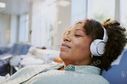 Preview: Woman Relaxing with Headphones in Living Room