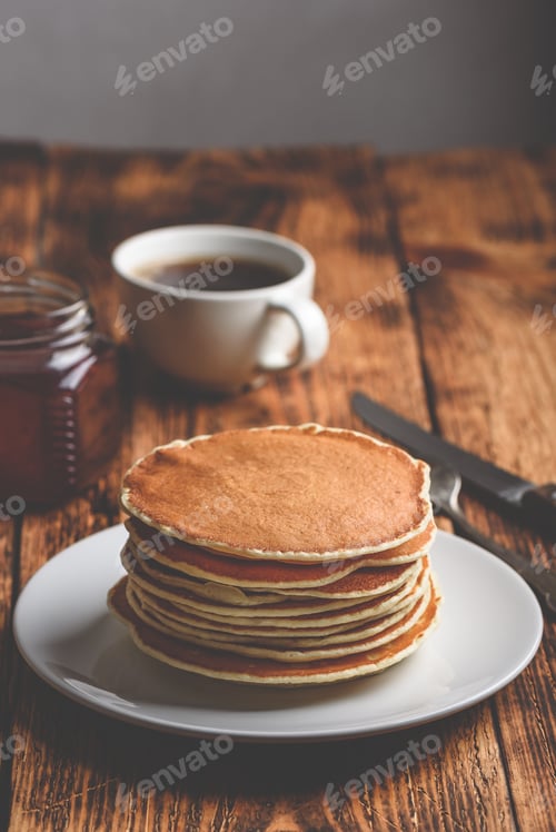 Preview: Stack of pancakes on white plate