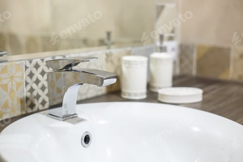 Preview: Water tap sink with faucet in expensive loft bathroom