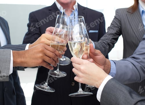 Preview: Close-Up Of Business Team Toasting With Champagne In The Office
