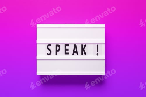 Preview: A Violet rectangle light box with speak in Magenta font on a Pink background