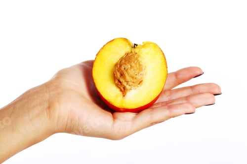 Preview: Peach fruit in woman's hand