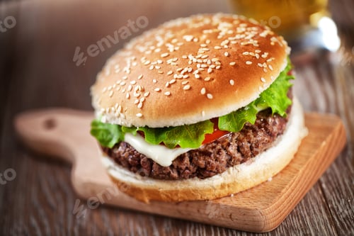 Preview: Big sandwich. Hamburger burger with beef, tomato, cheese and salad.