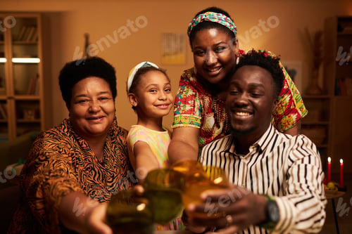 Preview: Family Toasting when Celebrating Kwanzaa Holiday