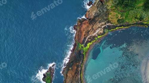 Preview: Aerial coastal landscape rocky shore. Picturesque wild cliffs on summer day.
