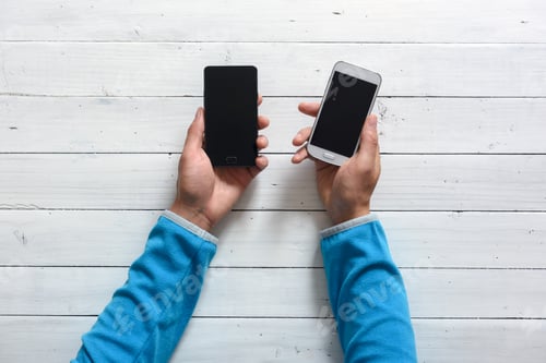 Preview: Mobile phones in hands