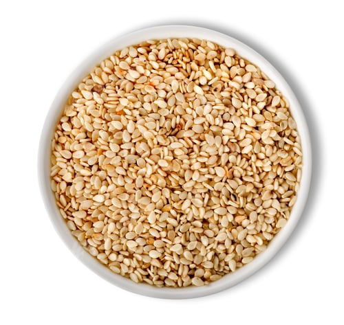 Preview: Sesame Seeds Filling White Bowl From Overhead