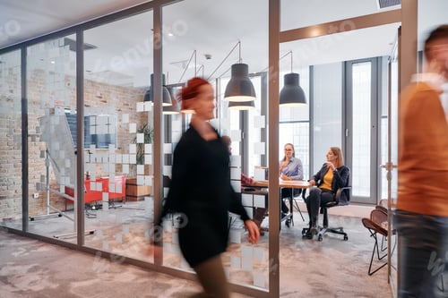 Preview: In the dynamic hustle and bustle of a business environment, a group of young business professionals