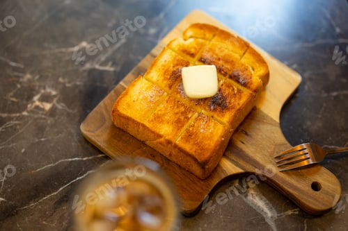 Preview: Roasted toast with butter on plate