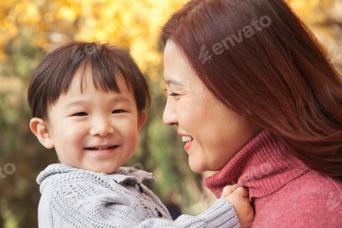 Preview: Mother and Son Enjoying a Park in Autumn