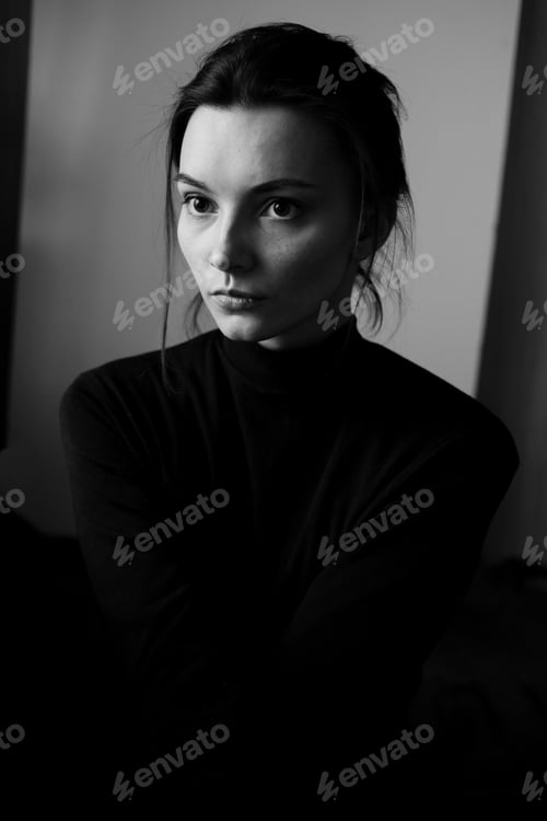 Preview: Black and white portrait of young beautiful woman in profile