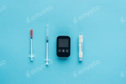 Preview: flat lay of medical equipment for diabetes control on blue background
