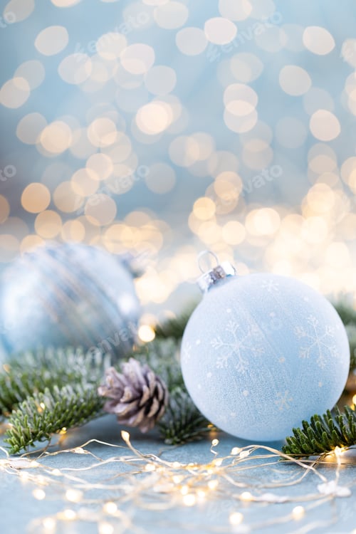 Preview: Christmas spruce with ball and blurred shiny lights.