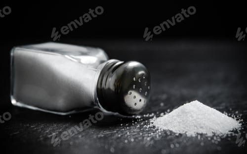 Preview: Salt background . On black table.