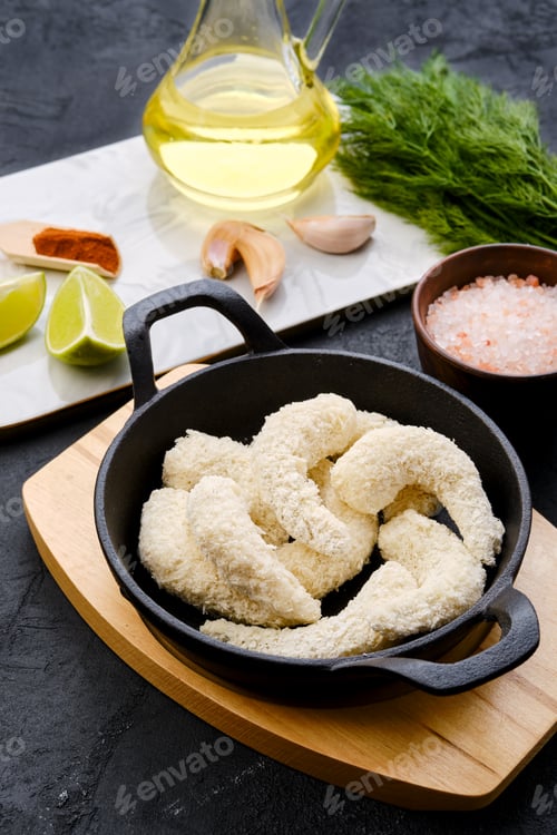 Preview: Prepared for frying shrimps in cheese breading with spice