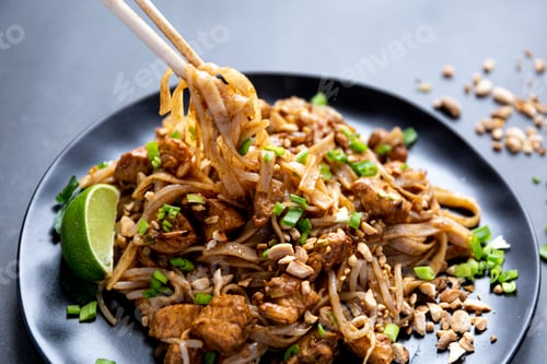 Preview: Eating pad thai with chopsticks