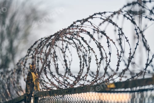 Preview: Barbed wire on fence of restricted area