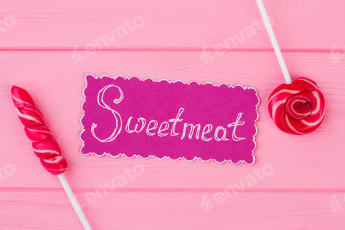 Preview: Composition with tasty lollipops on color background.