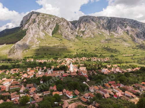 Preview: Aerial shot of Rimetea town in an amazing mountain landscape in Transylvania, Romania