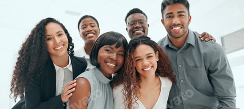 Preview: Cropped portrait of a diverse group of young businesspeople standing in the office