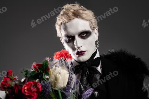 Preview: Captivating young man embraces Halloween spirit in a stunning dramatic costume