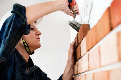 Preview: Constructor construction repair plastering on the wall