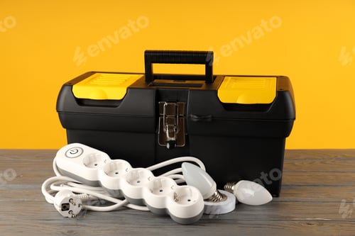 Preview: Concept of electrician or electrical tools on wooden table