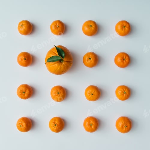 Preview: Creative pattern made of tangerines and orange on bright background. Flat lay minimal concept.