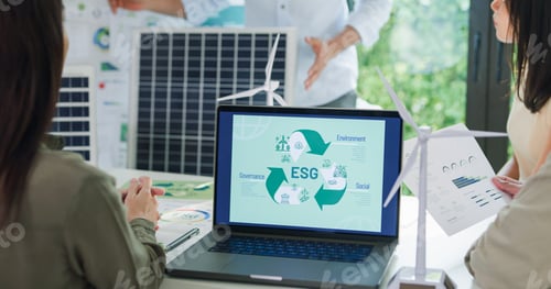Preview: Closeup group diverse Asia businesspeople talk ESG strategies risk management workshop.