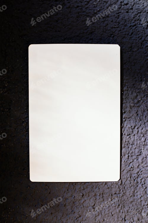 Preview: Piece of paper on black wall