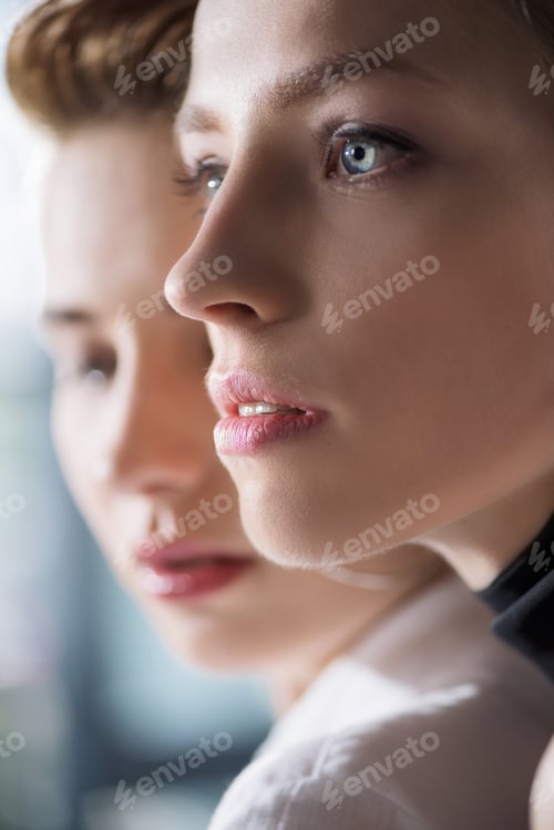 Preview: close-up portrait of young women looking away