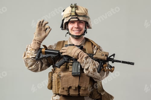 Preview: Smiling Man in Military Uniform Holding a Rifle