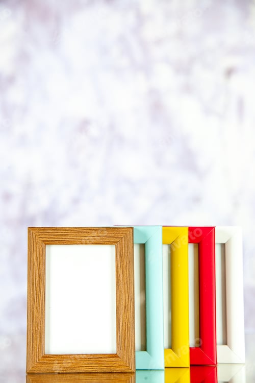 Preview: front view different picture frames with colored corners on light background photo portrait picture
