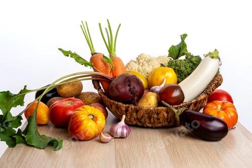 Preview: Freshly bunch harvest. Fresh farm vegetables in wicker basket. Healthy organic food