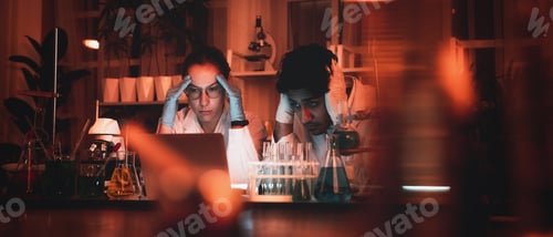 Preview: A microscope is being utilized for study in the lab by a group of scientists.