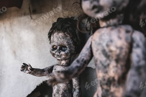Preview: selective focus of scary and burnt baby dolls, post apocalyptic concept