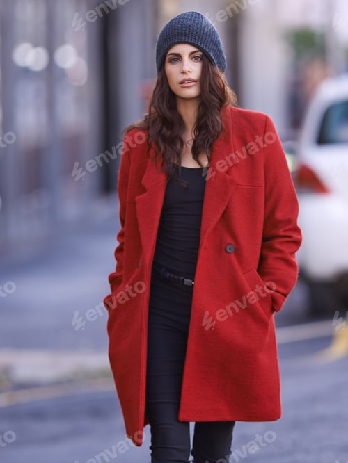 Preview: Urban style. Portrait of a beautiful young woman out and about in the city.