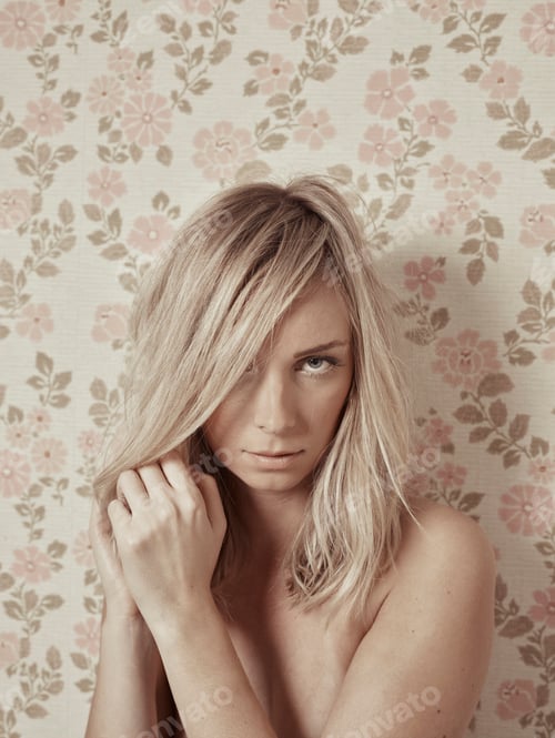 Preview: Serene contemplation against a floral backdrop