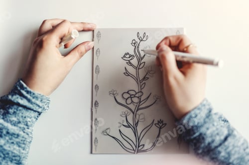 Preview: Woman doing linearity on paper at table