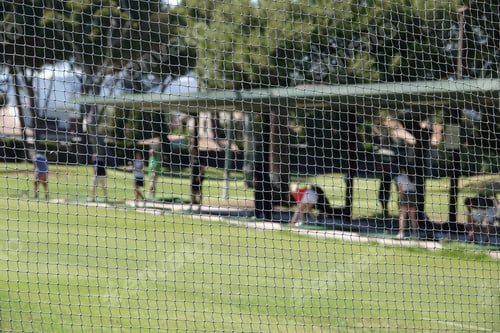 Preview: Closeup shot of a white net in a golf field