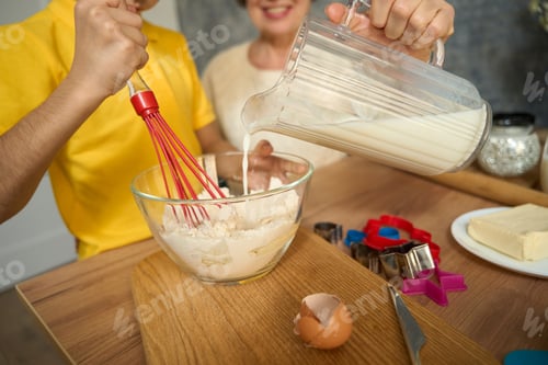 Preview: Kid cooking delicious food with his grandmother