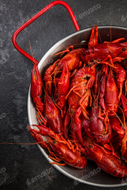 Preview: Red Crayfish in MEtal Saucepan, Top View on Dark Background