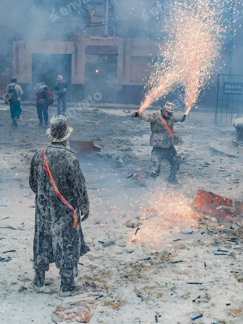 Preview: Ibi, Spain - December, 28 2018: People celebrating victory in flour and eggs battle