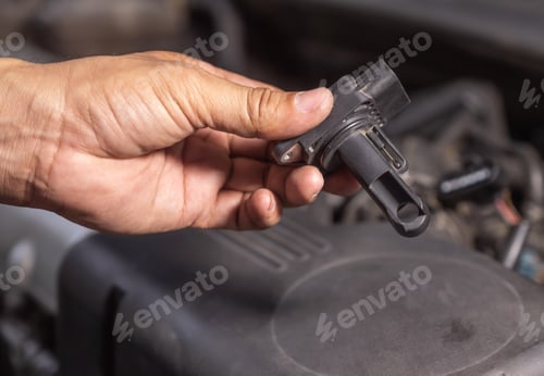 Preview: Check air flow meter automobile engine by car technician.