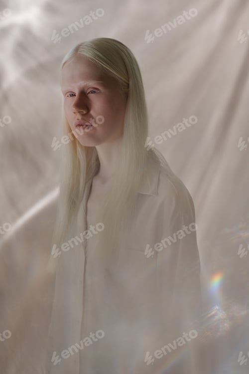 Preview: Mysterious Young Woman Studio Portrait