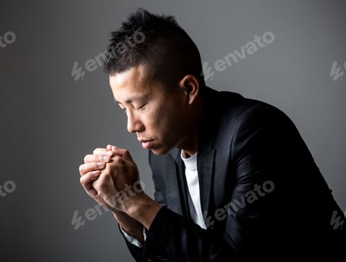 Preview: Man pray in darkness
