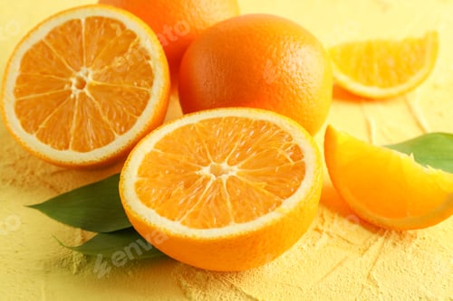 Preview: Ripe oranges with leaves on color background, closeup