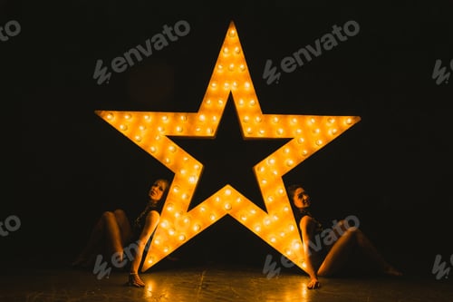 Preview: Girls Dance Against The Backdrop Of A Glowing Star