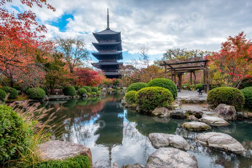 Preview: Ancient wood pagoda in Toji temple of unesco world heritage site in autumn garden at Kyoto