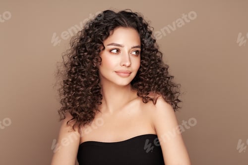 Preview: Beautiful smiling woman with afro curls